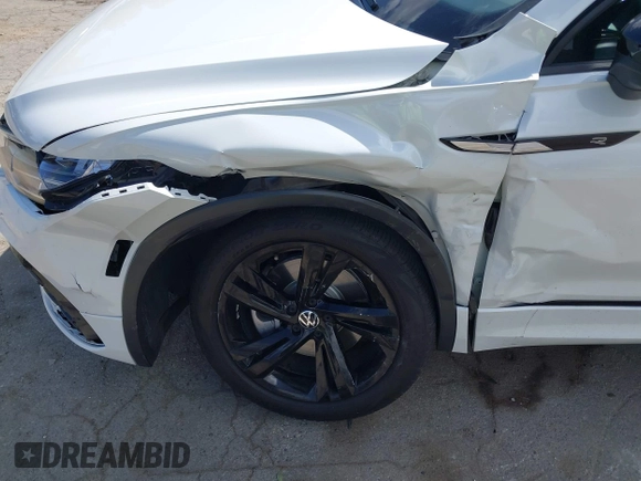 2023 Volkswagen Tiguan SE R-Line Black z VIN 3VVCB7AX3PM115373, wystawiony jako IAAI lot #42257944 z przebiegiem 22 316 mil mil oraz . Historia ofert i sprzedaży dostępna na DreamBid. Obrazek 17.