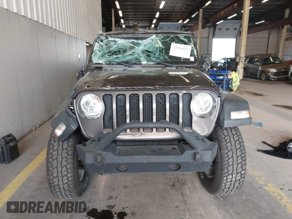2020 Jeep Wrangler Willys z VIN 1C4GJXAG4LW237057, wystawiony jako IAAI lot #42044223 z przebiegiem 54 802 mil mil oraz . Historia ofert i sprzedaży dostępna na DreamBid. Obrazek 13.
