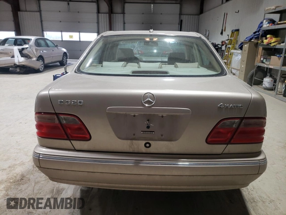 2001 Mercedes-Benz E-Class AWD with VIN WDBJF82J71X043474, listed as a Copart auction lot 45512025 with 59,571 mi miles and Salvage Title. Bid and sale history available at carsss.com. Image 6.