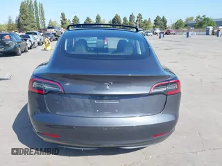 2018 Tesla Model 3 Long Range Battery with VIN 5YJ3E1EA4JF024102, listed as a IAAI auction lot 42100621 with 86,298 mi miles and . Bid and sale history available at DreamBid. Image 15.