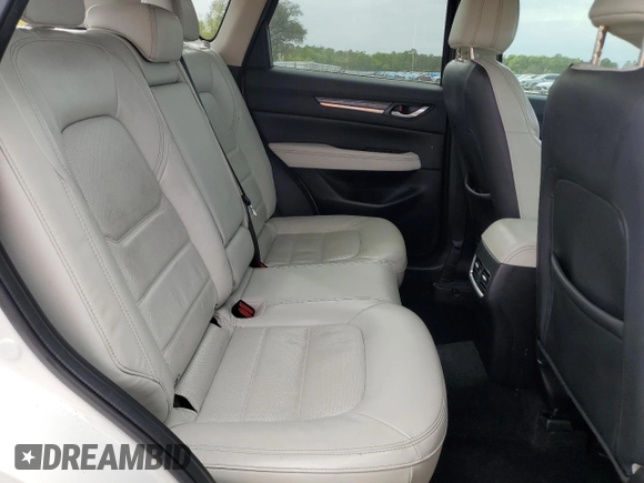 2017 Mazda CX-5 Grand Touring with VIN JM3KFADL9H0220886, listed as a Copart auction lot 50344675 with 75,781 mi miles and Salvage Title. Bid and sale history available at carsss.com. Image 11.