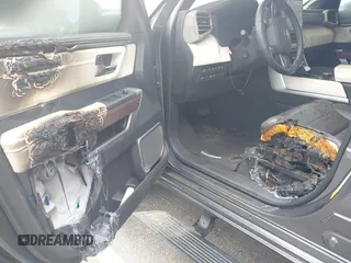 2022 Toyota Tundra Capstone Hybrid with VIN 5TFVC5DB4NX011801, listed as a IAAI auction lot 40218851 with 43,736 mi miles and . Bid and sale history available at DreamBid. Image 6.