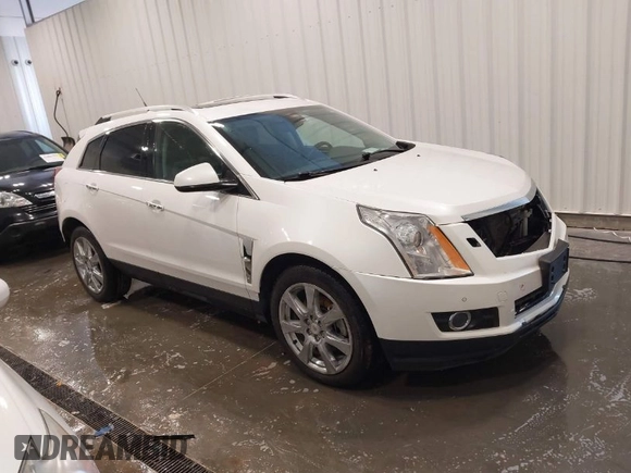 2012 Cadillac SRX Premium Collection z VIN 3GYFNFE38CS591123, wystawiony jako IAAI lot #41827636 z przebiegiem 143 867 mil mil oraz . Historia ofert i sprzedaży dostępna na DreamBid. Obrazek 1.