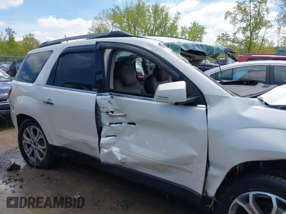 2013 GMC Acadia SLT z VIN 1GKKRRKD6DJ135765, wystawiony jako IAAI lot #42178221 z przebiegiem Nie podano mil oraz . Historia ofert i sprzedaży dostępna na DreamBid. Obrazek 14.