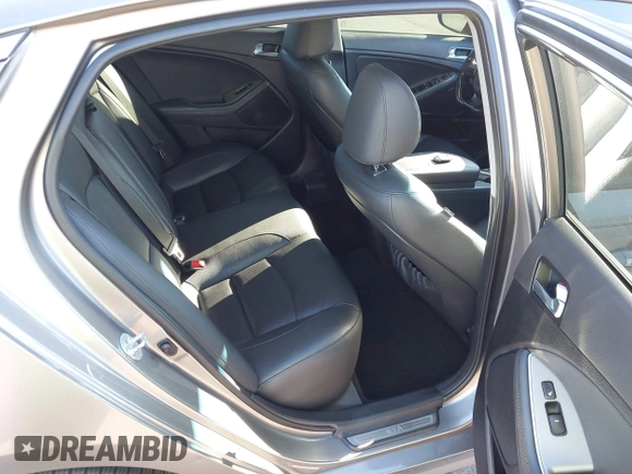 2015 Kia Optima SX Turbo with VIN 5XXGR4A66FG382167, listed as a IAAI auction lot 40951399 with 77,083 mi miles and . Bid and sale history available at DreamBid. Image 8.