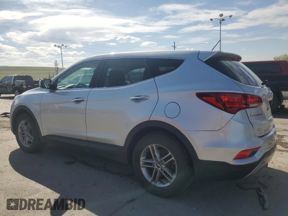 2018 Hyundai Santa Fe 2.4L z VIN 5XYZTDLB7JG572441, wystawiony jako Copart lot #52810145 z przebiegiem 106 578 mil mil oraz Szkoda całkowita • Salvage title. Historia ofert i sprzedaży dostępna na DreamBid. Obrazek 2.