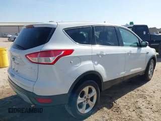 2013 Ford Escape SE with VIN 1FMCU0GX1DUA80455, listed as a IAAI auction lot 41756952 with 211,389 mi miles. Bid and sale history available at carsss.com. Image 4.