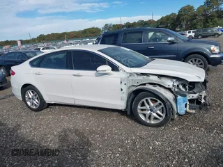 2016 Ford Fusion SE with VIN 3FA6P0H76GR235669, listed as a IAAI auction lot 40593164 with 121,973 mi miles and . Bid and sale history available at DreamBid. Image 13.