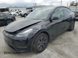 2024 Tesla Model Y Long Range z VIN 7SAYGDEEXRF209029, wystawiony jako Copart lot #50042765 z przebiegiem 16 420 mil mil oraz Szkoda całkowita • Salvage title. Historia ofert i sprzedaży dostępna na DreamBid. Obrazek 1.