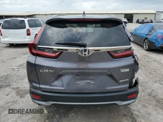 2020 Honda CR-V Touring z VIN 7FARW1H97LE009965, wystawiony jako Copart lot #55317275 z przebiegiem 47 369 mil mil oraz Szkoda całkowita • Salvage title. Historia ofert i sprzedaży dostępna na DreamBid. Obrazek 6.
