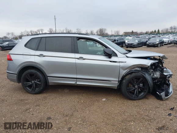 2023 Volkswagen Tiguan SE R-Line Black with VIN 3VV8B7AX3PM130610, listed as a IAAI auction lot 42011131 with 21,980 mi miles and . Bid and sale history available at DreamBid. Image 13.