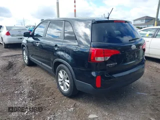 2014 Kia Sorento LX with VIN 5XYKTCA6XEG466573, listed as a IAAI auction lot 42092207 with 157,925 mi miles and . Bid and sale history available at carsss.com. Image 3.