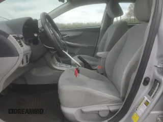 2012 Toyota Corolla L with VIN 2T1BU4EE0CC800140, listed as a Copart auction lot 52686455 with 203,407 mi miles and Salvage Title. Bid and sale history available at carsss.com. Image 7.