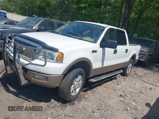 2004 Ford F-150 XLT with VIN 1FTPW12504KC34452, listed as a IAAI auction lot 42051599 with 215,857 mi miles. Bid and sale history available at carsss.com. Image 2.