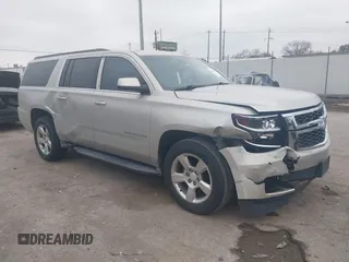 2015 Chevrolet Suburban LT with VIN 1GNSCJKC4FR744208, listed as a IAAI auction lot 41612915 with 87,445 mi miles and . Bid and sale history available at DreamBid. Image 1.