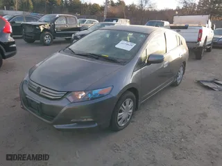 2010 Honda Insight LX with VIN JHMZE2H52AS014667, listed as a IAAI auction lot 41258620 with 138,419 mi miles. Bid and sale history available at carsss.com. Image 17.