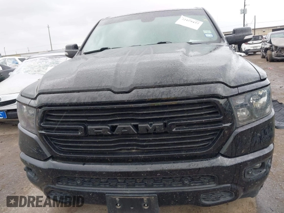 2021 Ram 1500 Lone Star with VIN 1C6RREFT6MN709754, listed as a IAAI auction lot 42189437 with 73,542 mi miles and . Bid and sale history available at DreamBid. Image 13.