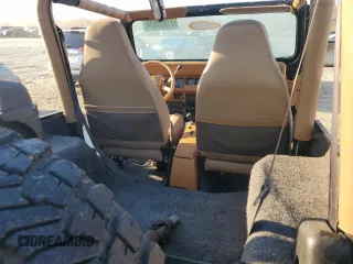 1995 Jeep Wrangler Sahara with VIN 1J4FY49S6SP272569, listed as a Copart auction lot 77839534 with 162,080 mi miles and Salvage Title. Bid and sale history available at carsss.com. Image 10.