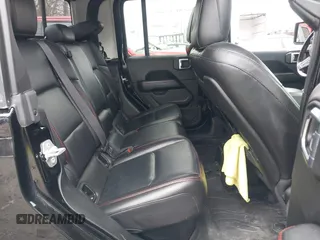 2021 Jeep Gladiator Rubicon z VIN 1C6JJTBG8ML524215, wystawiony jako IAAI lot #41829990 z przebiegiem 62 942 mil mil oraz . Historia ofert i sprzedaży dostępna na DreamBid. Obrazek 8.