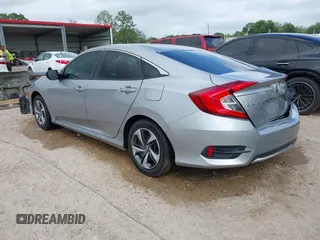 2019 Honda Civic LX with VIN 19XFC2F60KE043806, listed as a IAAI auction lot 41915894 with 123,141 mi miles and . Bid and sale history available at DreamBid. Image 3.