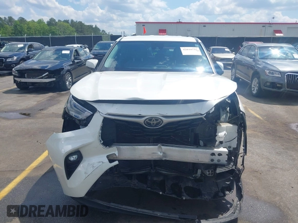 2021 Toyota Highlander L with VIN 5TDZZRAH7MS516123, listed as a IAAI auction lot 42010742 with 63,299 mi miles and . Bid and sale history available at DreamBid. Image 13.