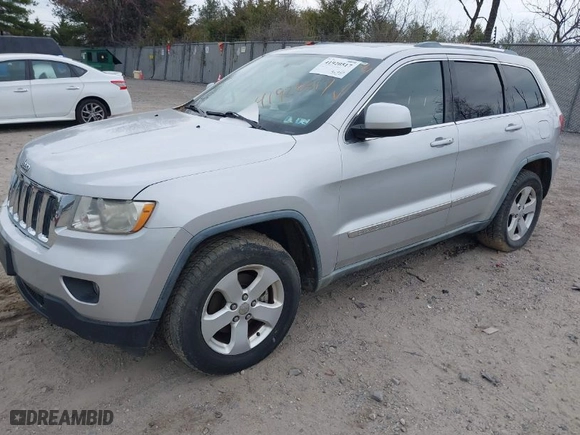 2011 Jeep Grand Cherokee Laredo with VIN 1J4RR4GG9BC718861, listed as a IAAI auction lot 41920517 with 144,245 mi miles. Bid and sale history available at carsss.com. Image 2.