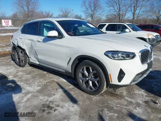 2024 BMW X4 xDrive30i with VIN 5UX33DT03R9U16526, listed as a IAAI auction lot 41410199 with 7,268 mi miles. Bid and sale history available at carsss.com. Image 1.