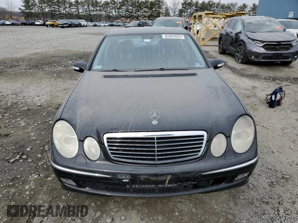 2005 Mercedes-Benz E 5.0L with VIN WDBUF70J45A645154, listed as a Copart auction lot 82883524 with 134,088 mi miles and Salvage Title. Bid and sale history available at carsss.com. Image 5.