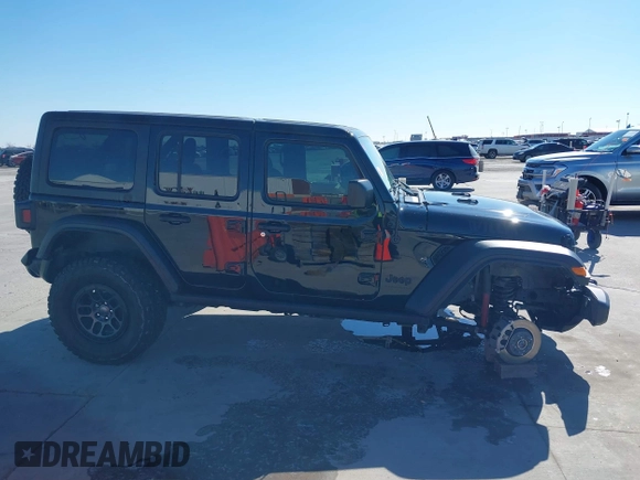 2023 Jeep Wrangler Sport S z VIN 1C4HJXDG5PW530892, wystawiony jako IAAI lot #41389577 z przebiegiem 17 014 mil mil oraz . Historia ofert i sprzedaży dostępna na DreamBid. Obrazek 14.