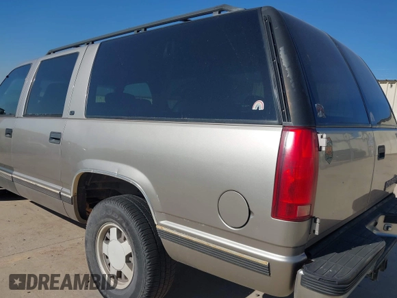 1999 Chevrolet Suburban with VIN 3GNEC16RXXG111175, listed as a IAAI auction lot 41193569 with 276,326 mi miles and . Bid and sale history available at DreamBid. Image 6.