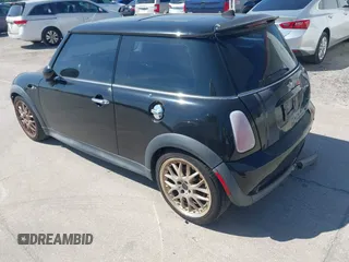 2005 MINI Hardtop S with VIN WMWRE33425TD90534, listed as a IAAI auction lot 41687089 with 157,600 mi miles and . Bid and sale history available at DreamBid. Image 3.