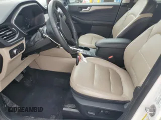 2021 Ford Escape SEL z VIN 1FMCU9H67MUA65291, wystawiony jako Copart lot #63403555 z przebiegiem 122 034 mil mil oraz Szkoda całkowita • Salvage title. Historia ofert i sprzedaży dostępna na DreamBid. Obrazek 7.