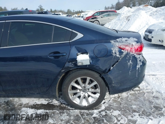 2016 Mazda 6 i Sport with VIN JM1GJ1U53G1407290, listed as a IAAI auction lot 41579668 with 131,527 mi miles and . Bid and sale history available at DreamBid. Image 6.