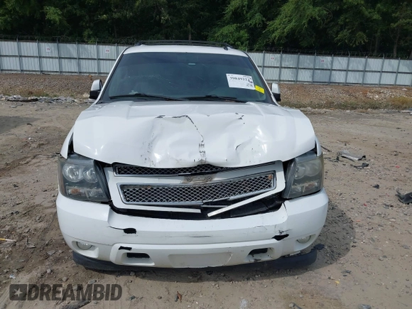 2014 Chevrolet Suburban LT with VIN 1GNSCJE08ER185472, listed as a IAAI auction lot 39849223 with 198,853 mi miles. Bid and sale history available at carsss.com. Image 12.