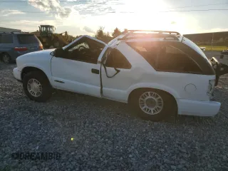 2001 GMC Jimmy SLS Comfort/Convenience with VIN 1GKCT18W31K181320, listed as a Copart auction lot 73676454 with 135,419 mi miles and Salvage Title. Bid and sale history available at carsss.com. Image 2.
