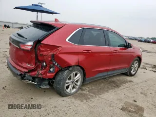 2020 Ford Edge SEL с VIN 2FMPK3J96LBA69376, выставлен на аукционе Copart как лот 57553395 с пробегом 69 468 миль миль и Списание • Salvage title. История ставок и продаж доступна на DreamBid. Изображение 3.
