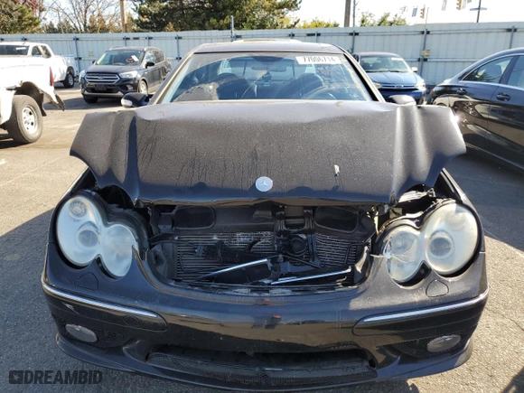 2003 Mercedes-Benz CLK-Class 5.0L with VIN WDBTJ75JX3F039229, listed as a Copart auction lot 77006714 with 111,617 mi miles and Salvage Title. Bid and sale history available at carsss.com. Image 5.