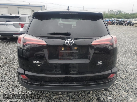 2017 Toyota RAV4 LE z VIN 2T3BFREV4HW663532, wystawiony jako Copart lot #57798035 z przebiegiem 100 922 mil mil oraz Szkoda całkowita • Salvage title. Historia ofert i sprzedaży dostępna na DreamBid. Obrazek 6.