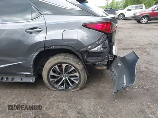 2022 Lexus RX 350 z VIN 2T2HZMDA8NC313731, wystawiony jako IAAI lot #42190259 z przebiegiem 144 177 mil mil oraz . Historia ofert i sprzedaży dostępna na DreamBid. Obrazek 6.