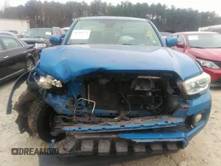 2018 Toyota Tacoma SR5 with VIN 3TMAZ5CN3JM066409, listed as a IAAI auction lot 41204775 with 75,000 mi miles and . Bid and sale history available at DreamBid. Image 12.