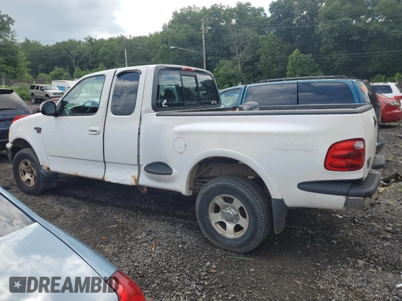 2000 Ford F-150 with VIN 2FTRX08W3YCA36619, listed as a Copart auction lot 62683885 with Not provided miles and Salvage title. Bid and sale history available at DreamBid. Image 2.