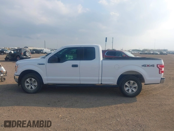 2020 Ford F-150 XL with VIN 1FTFX1E51LKF58027, listed as a IAAI auction lot 41207102 with 162,736 mi miles and . Bid and sale history available at DreamBid. Image 14.