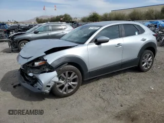 2021 Mazda CX-30 Select with VIN 3MVDMABLXMM256327, listed as a Copart auction lot 51185235 with 76,630 mi miles and Salvage Title. Bid and sale history available at DreamBid. Image 1.
