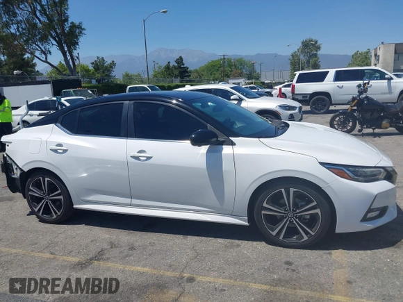 2021 Nissan Sentra SR z VIN 3N1AB8DV0MY245835, wystawiony jako IAAI lot #42320378 z przebiegiem 100 949 mil mil oraz . Historia ofert i sprzedaży dostępna na DreamBid. Obrazek 14.