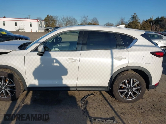 2018 Mazda CX-5 S Premium with VIN JM3KFBDM8J1419006, listed as a IAAI auction lot 41498658 with 123,622 mi miles and . Bid and sale history available at DreamBid. Image 15.