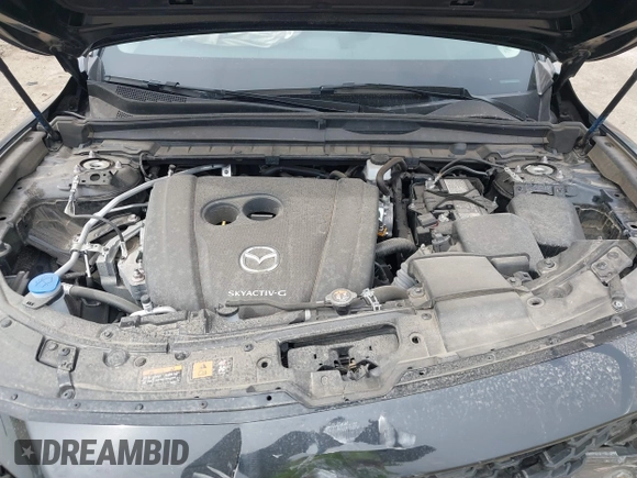 2024 Mazda CX-50 S Premium with VIN 7MMVABDM9RN155593, listed as a IAAI auction lot 41784433 with 20,549 mi miles and . Bid and sale history available at DreamBid. Image 10.