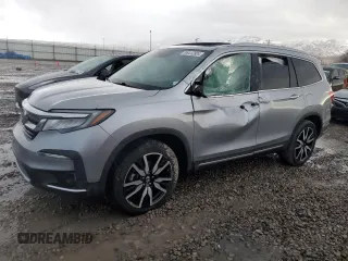 2020 Honda Pilot Touring 8-Passenger with VIN 5FNYF6H9XLB042625, listed as a Copart auction lot 86412804 with 52,061 mi miles and Salvage Title. Bid and sale history available at DreamBid. Image 1.