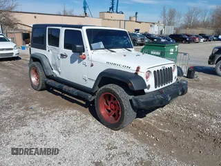 2016 Jeep Wrangler Unlimited Rubicon Hard Rock with VIN 1C4HJWFG9GL296782, listed as a IAAI auction lot 41595273 with 113,338 mi miles. Bid and sale history available at carsss.com. Image 1.