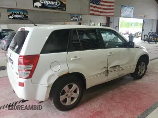 2013 Suzuki Grand Vitara Premium with VIN JS3TD0D64D4100568, listed as a Copart auction lot 63958985 with 140,668 mi miles and Salvage title. Bid and sale history available at DreamBid. Image 3.