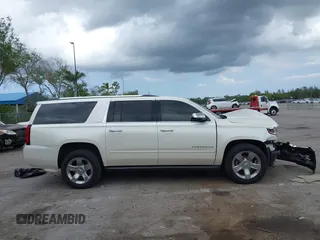 2015 Chevrolet Suburban LTZ with VIN 1GNSKKKC4FR687923, listed as a IAAI auction lot 42192062 with 139,873 mi miles and . Bid and sale history available at DreamBid. Image 13.